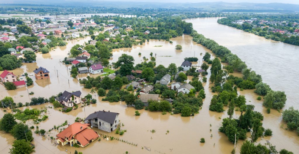 Aerial view of flooded houses with dirty water of Dnister river in Halych town, western Ukraine.