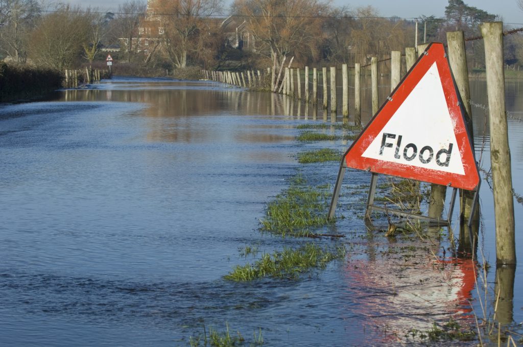 Flooded road and fields in the uK